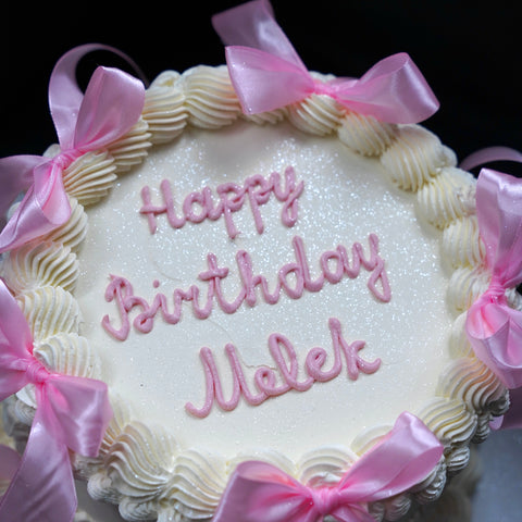 Zarter Vintage-Torte mit Glitzer und rosa Schleifen